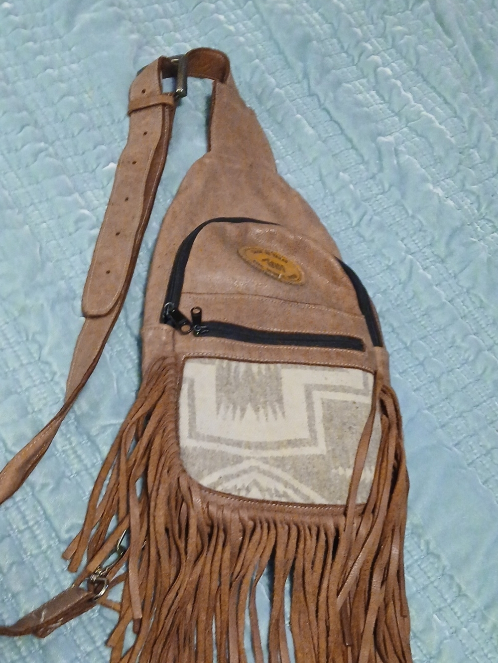 Fringed Suede Crossbody Sling Backpack in Light Brown